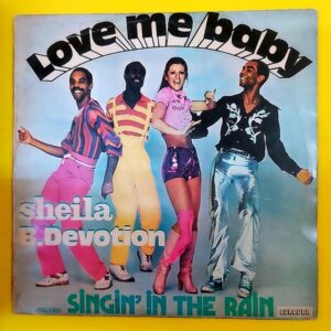 Sheila B. Devotion – Love Me Baby-Singin' In The Rain - Plak